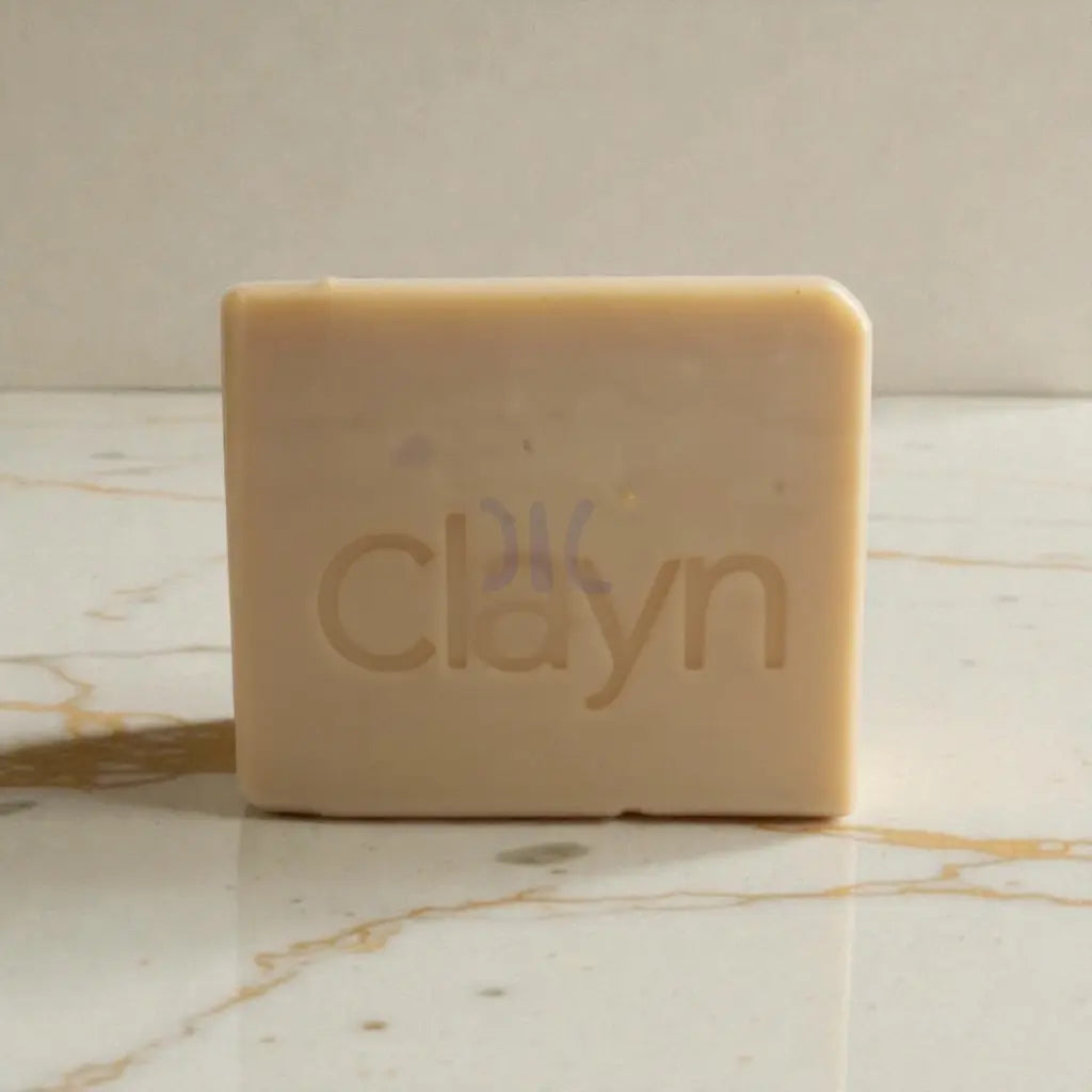 Bar of soap with 'clayn' branding on a marble surface