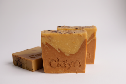 Three bars of Claryn soap on a white background