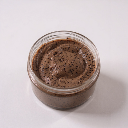 Jar of coffee scrub on a white background